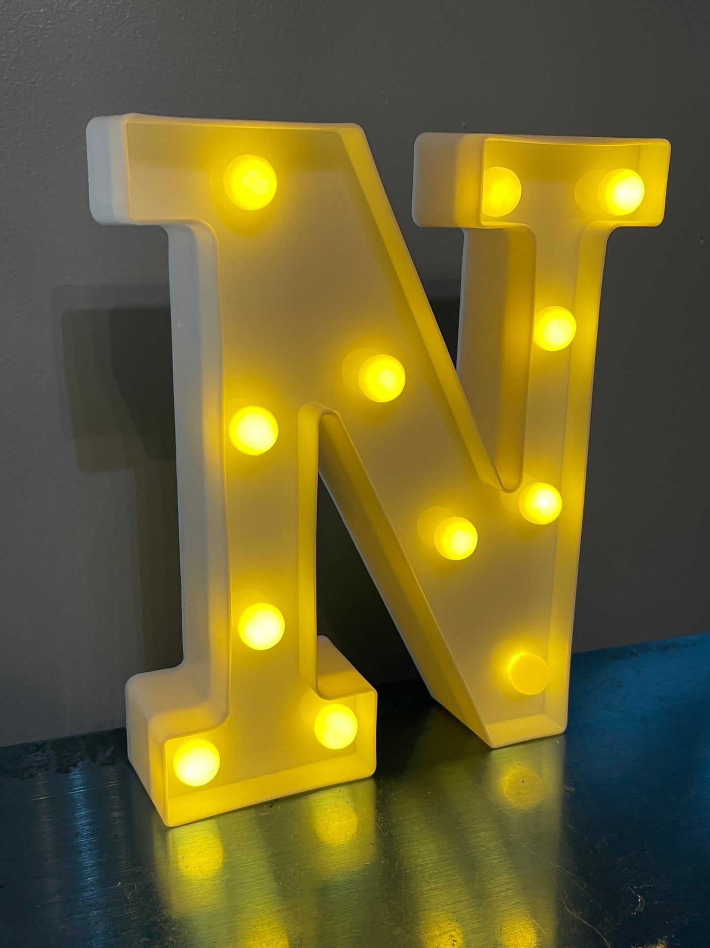 White Letter “N” lighted